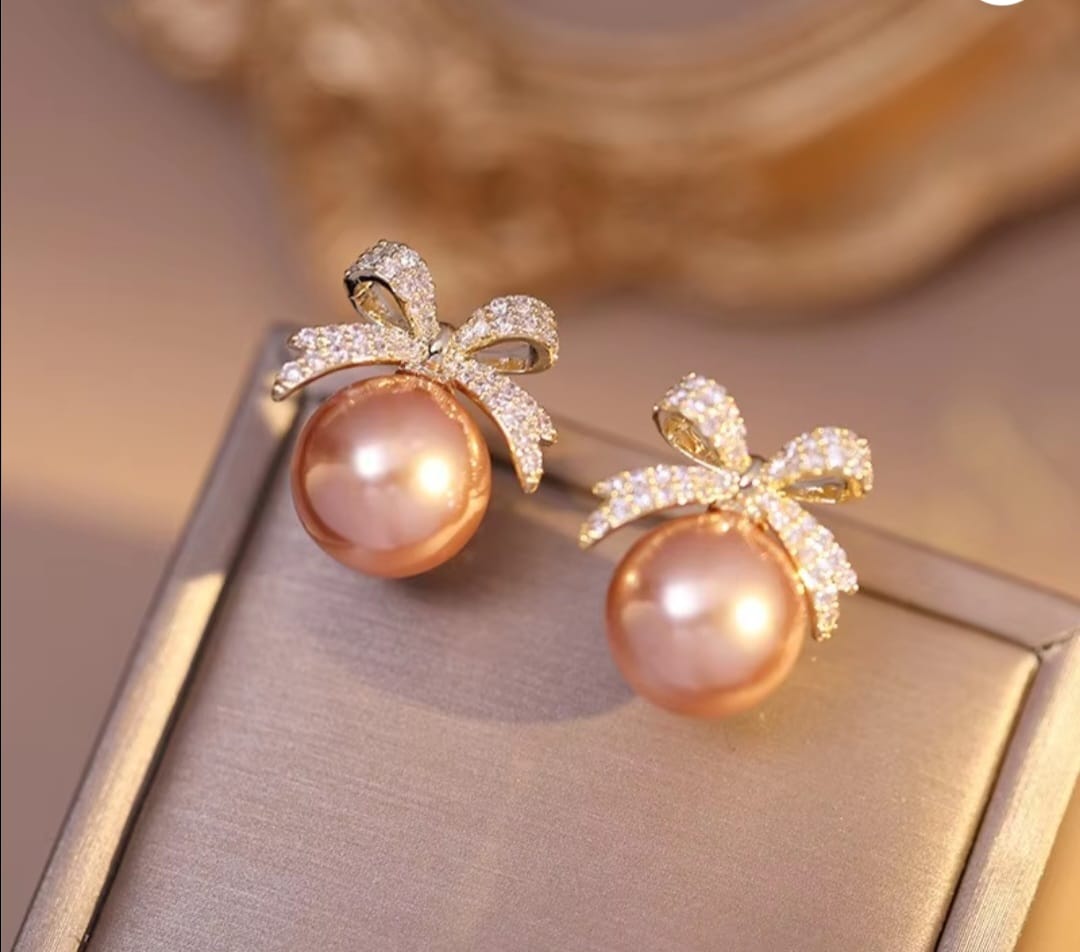 Zevira Pearl Bow Luxe Stud Earrings